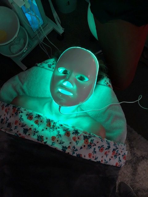 LED mask treatment being performed